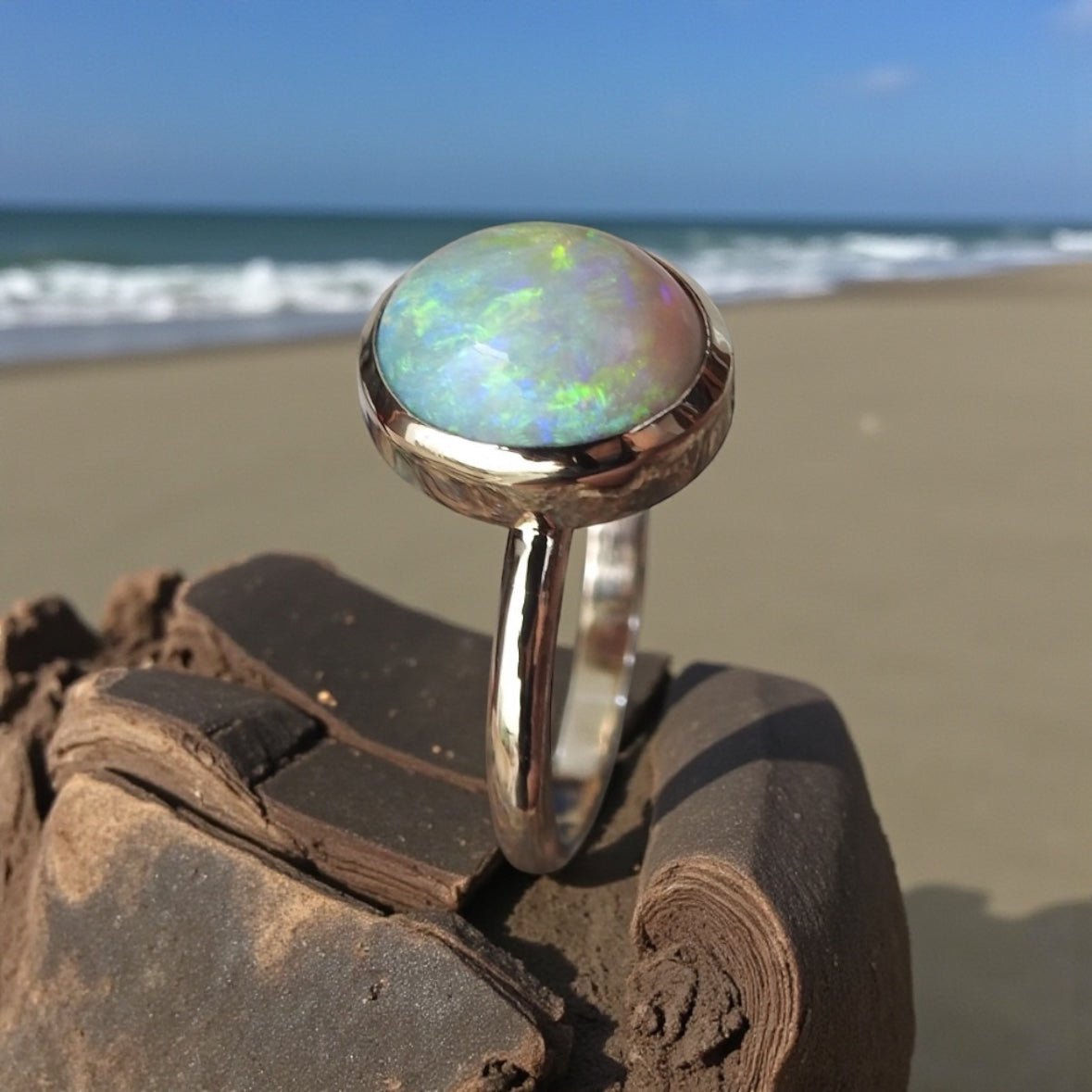 Simpson Halo ~ 3.3ct Solid Lightning Ridge Opal 9ct Yellow Gold Ring