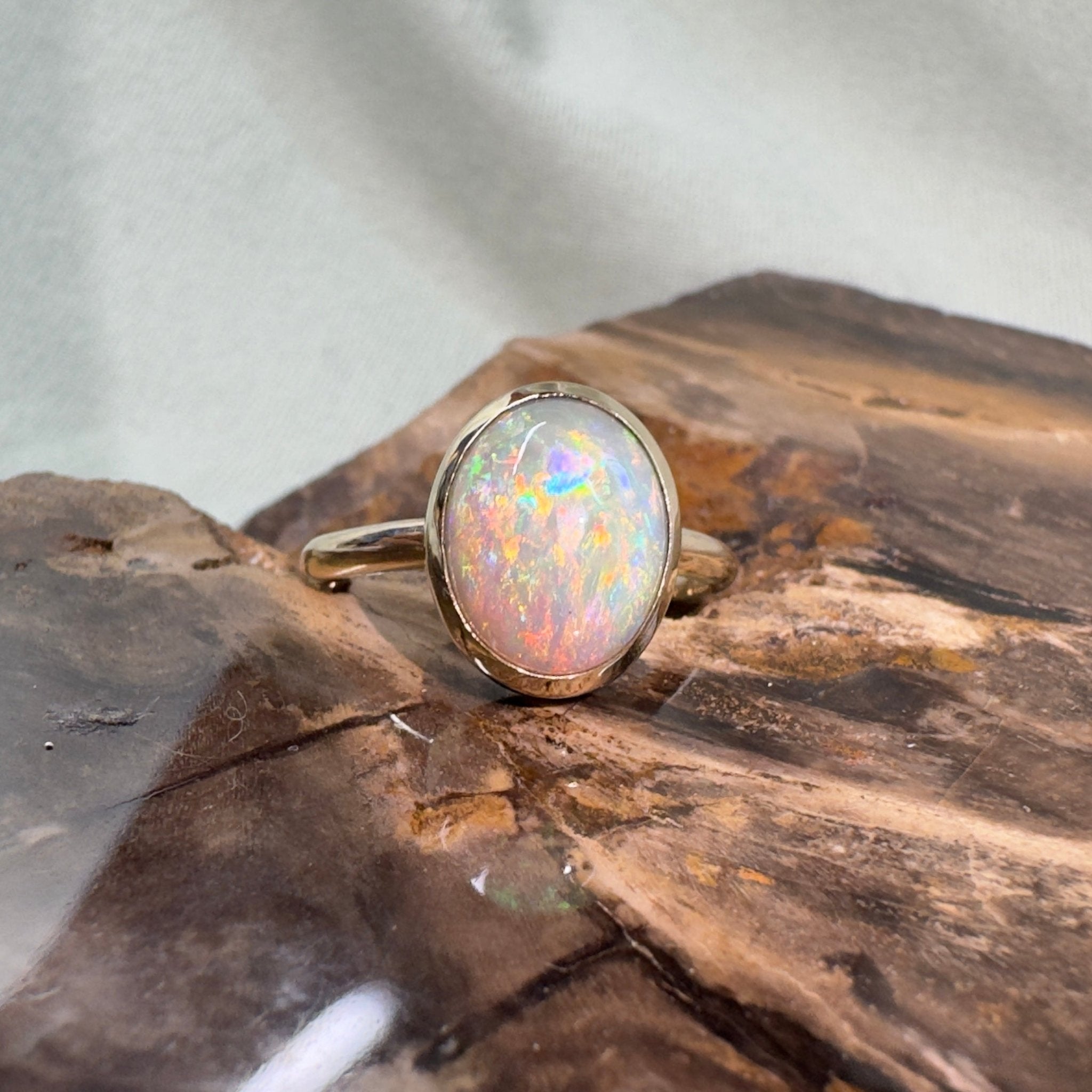 Simpson Halo ~ 3.3ct Solid Lightning Ridge Opal 9ct Yellow Gold Ring