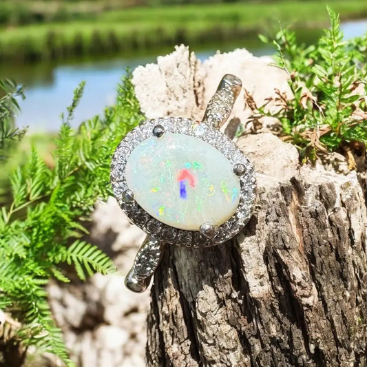 Opal ring with diamond halo from Snowy Peaks handcrafted sterling silver jewelry