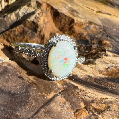 Opal ring with diamond halo from Snowy Peaks handcrafted 1ct Coober Pedy Opal silver ring