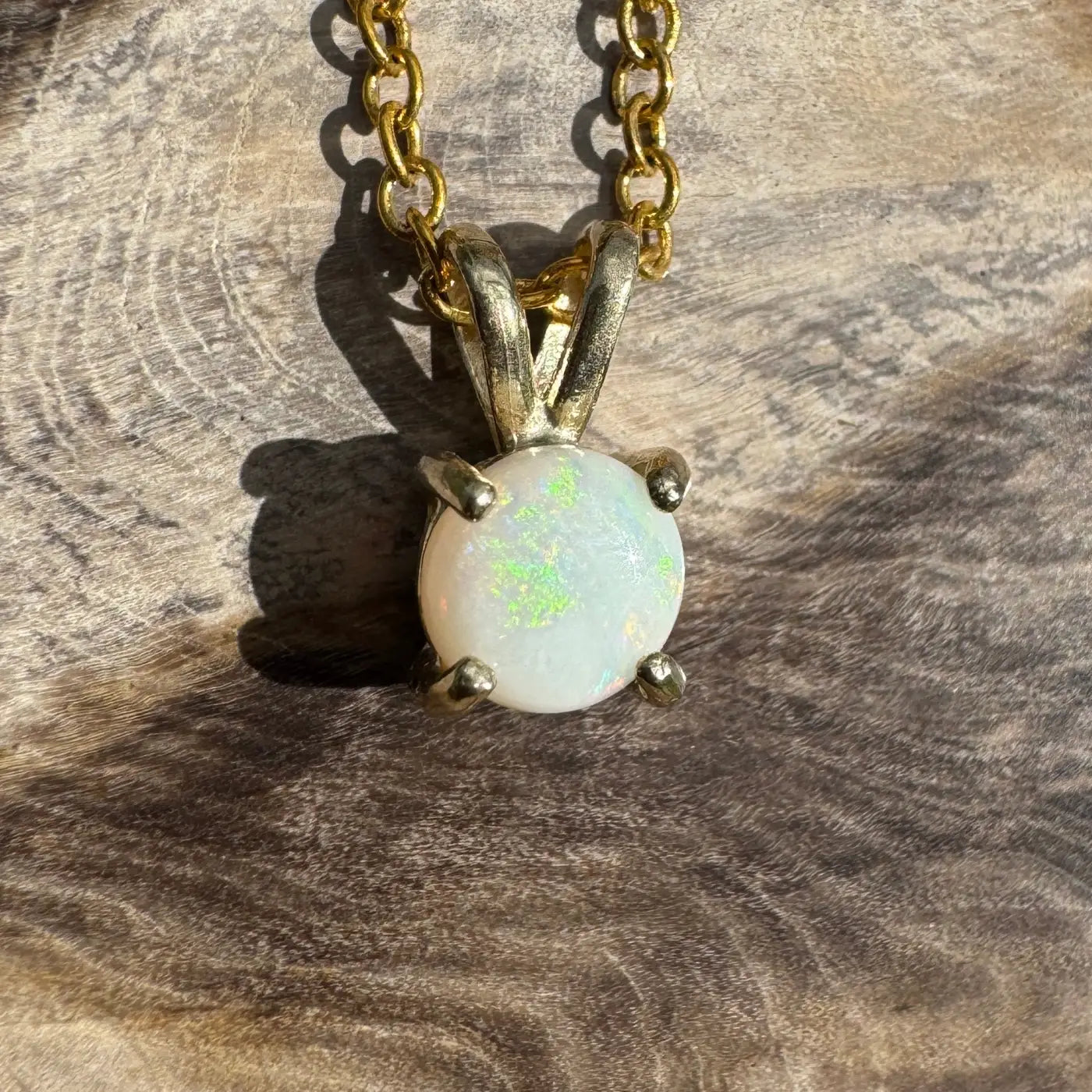 Gold chain necklace featuring a handcrafted 9ct solid gold Opal pendant from Coober Pedy