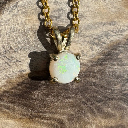 Gold chain necklace featuring a handcrafted 9ct solid gold Opal pendant from Coober Pedy