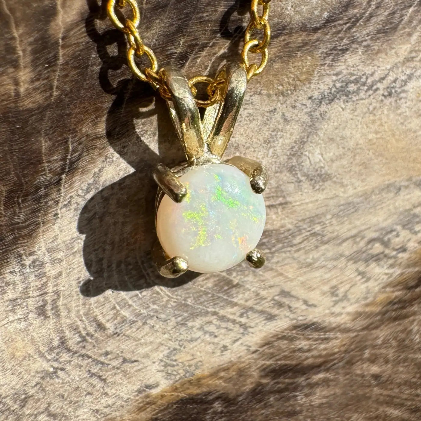 Gold chain necklace with a handcrafted 0.9ct Coober Pedy Opal pendant from Sunflare