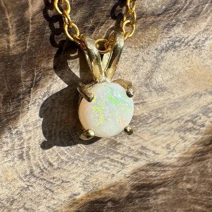 Gold chain necklace with a handcrafted 0.9ct Coober Pedy Opal pendant from Sunflare