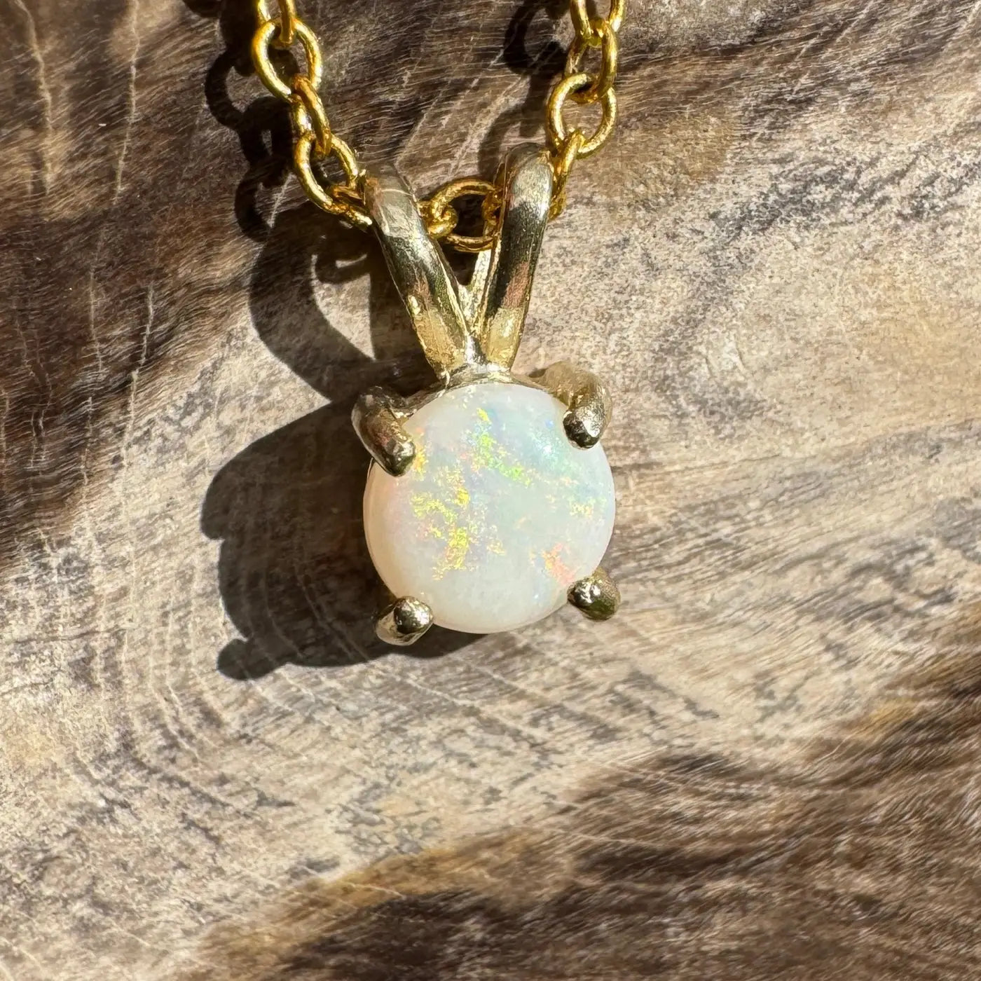 Gold chain necklace with a handcrafted 0.9ct Coober Pedy Opal pendant named Sunflare