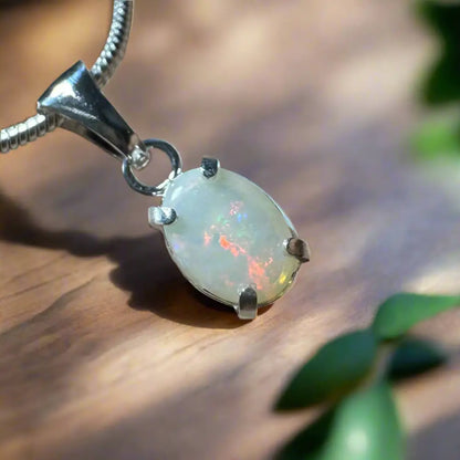 Opal pendant with silver setting from Sunset Reds handcrafted Coober Pedy Opal necklace