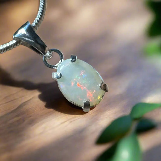 Opal pendant with silver setting from Sunset Reds handcrafted Coober Pedy Opal necklace