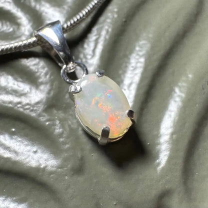 Sunset Reds handcrafted 0.7ct Coober Pedy Opal pendant with silver setting