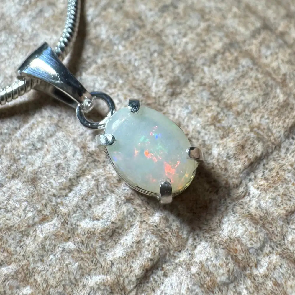 Opal pendant with silver setting from Sunset Reds handcrafted Coober Pedy Opal necklace