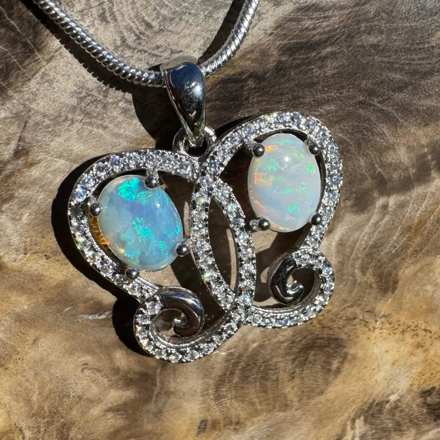 Silver opal butterfly pendant from The Coober Ridge Butterfly handcrafted necklace