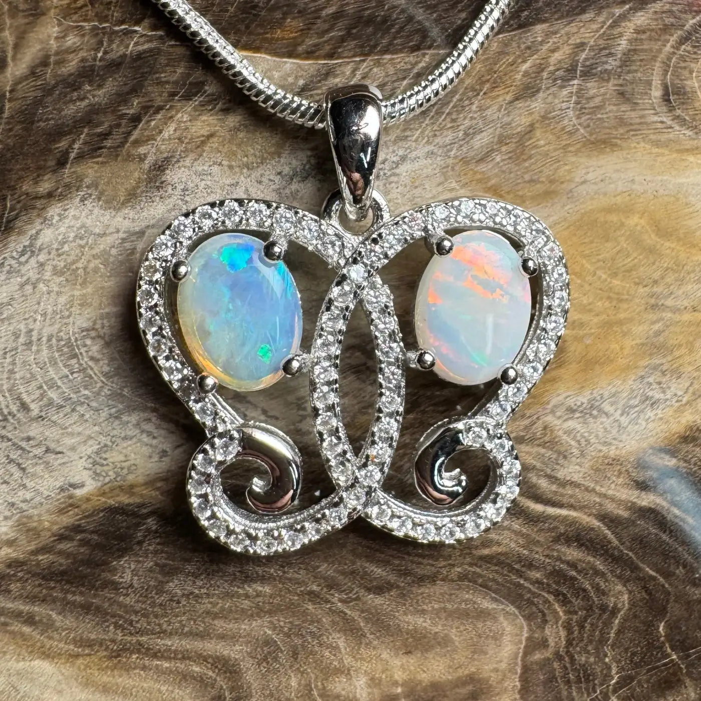 Opal butterfly pendant necklace with Coober Pedy and Lightning Ridge opals in sterling silver