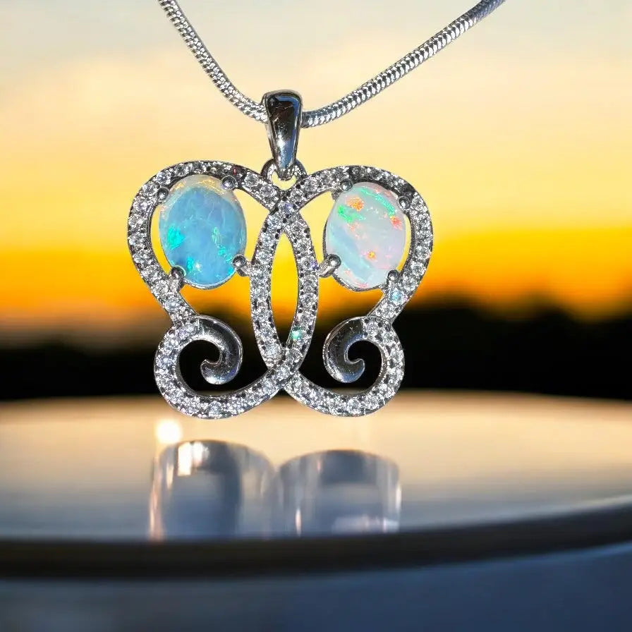 Butterfly-shaped opal pendant necklace with solid Coober Pedy and Lightning Ridge opals