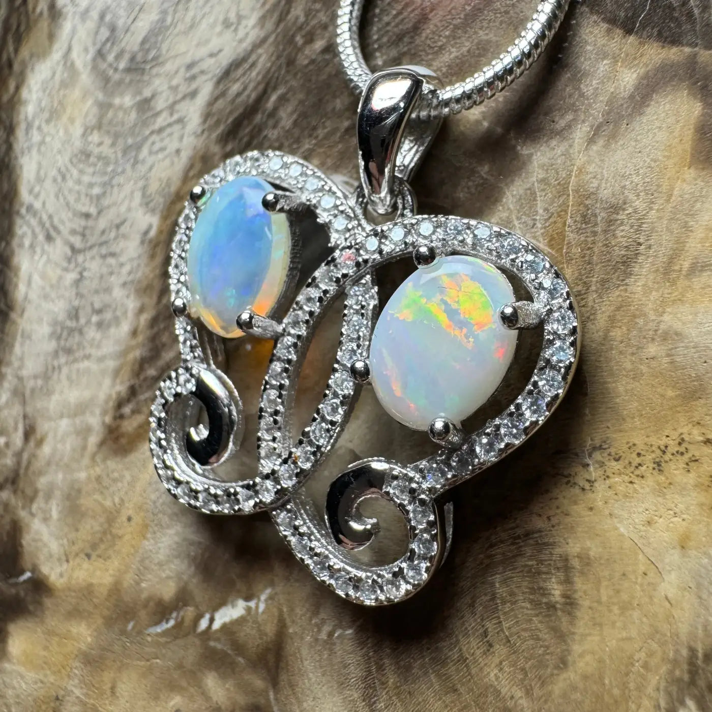 Silver opal pendant from The Coober Ridge Butterfly handcrafted necklace featuring Coober Pedy and Lightning Ridge opals