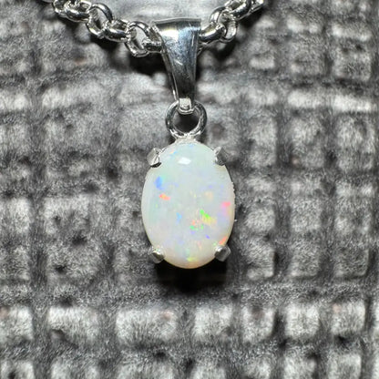 Silver opal pendant necklace with a 0.9ct Coober Pedy opal in sterling silver setting
