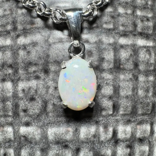 Silver opal pendant necklace with a 0.9ct Coober Pedy opal in sterling silver setting
