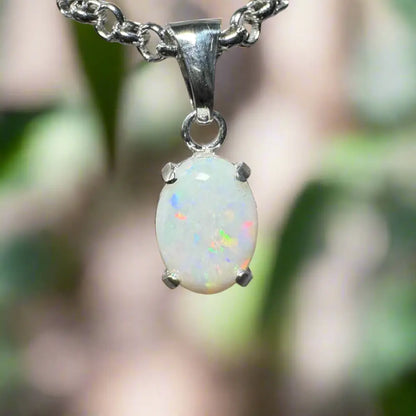 Oval opal pendant necklace from Three Sisters Shine featuring a handcrafted 0.9ct Coober Pedy Opal in sterling silver