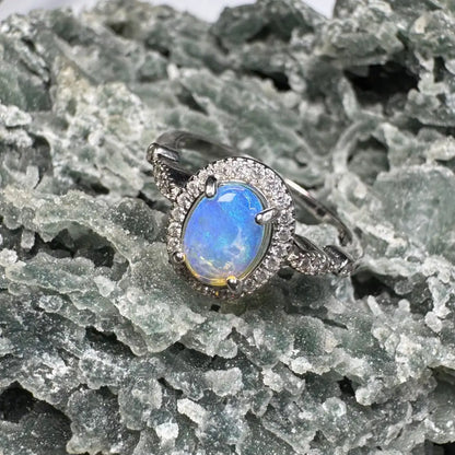 Opal ring with diamond halo from Wave Rock Grace featuring Lightning Ridge Opal and Zirconia