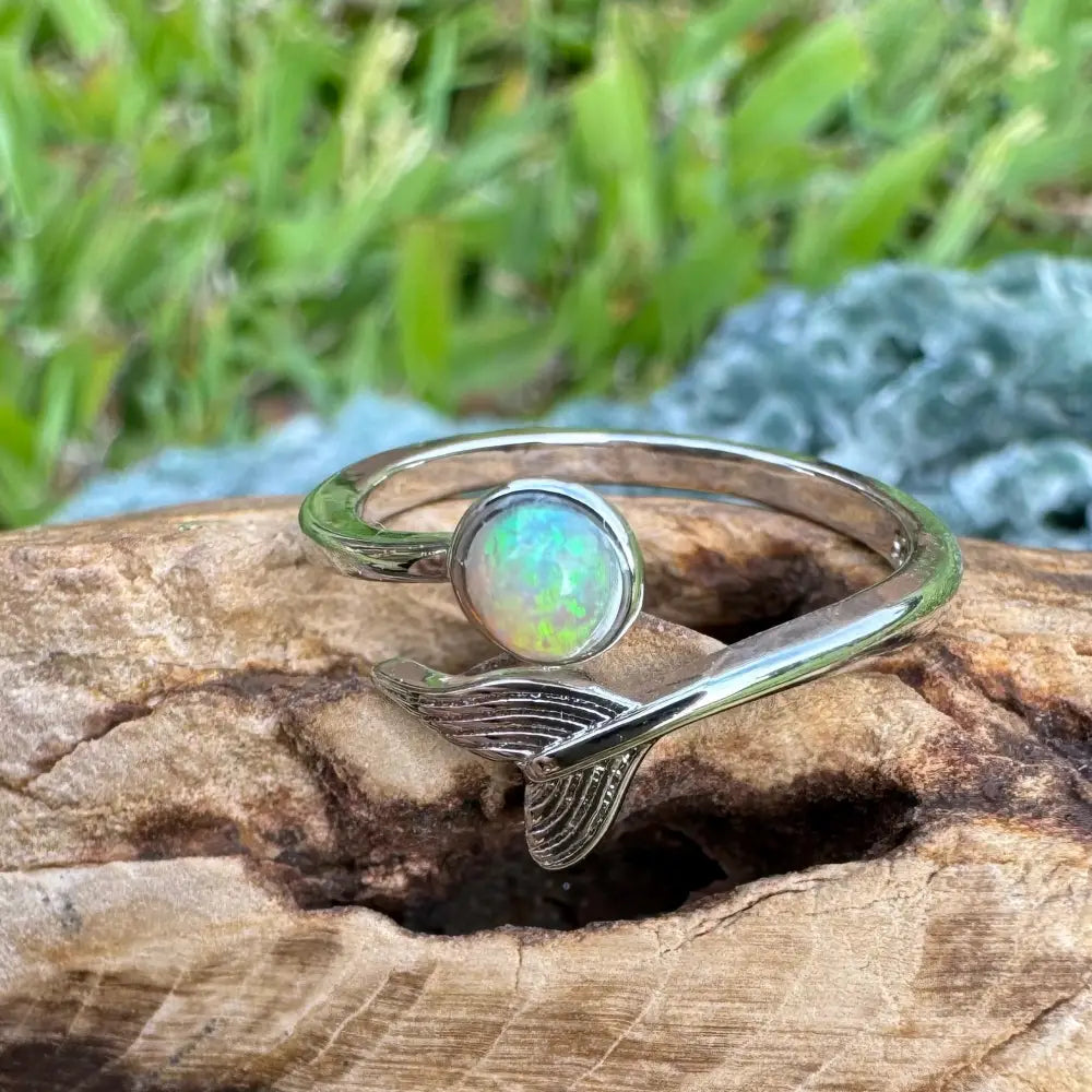 Silver ring with opal and mermaid tail design from Where the Ocean meets the Outback collection