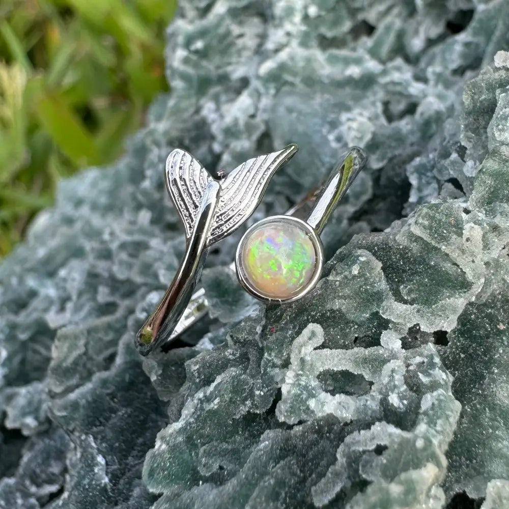 Silver mermaid tail ring with opal featuring a handcrafted Lightning Ridge opal in sterling silver