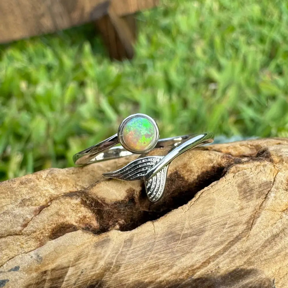 Silver opal mermaid tail ring featuring a 0.3ct Lightning Ridge Opal in sterling silver