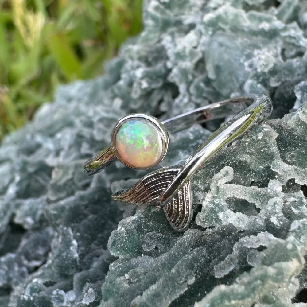 Silver sterling ring featuring Lightning Ridge opal and mermaid tail design