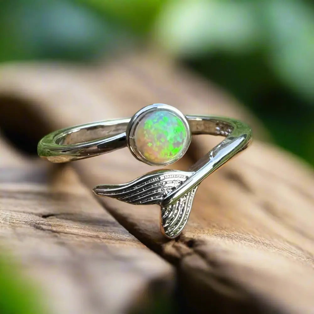 Silver ring with opal and mermaid tail detail from Where the Ocean meets the Outback handcrafted jewelry