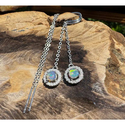 Silver opal halo earrings named Whitsunday Sparkle featuring 0.7ct Lightning Ridge opal and cubic zirconia